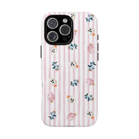 A protective phone case with a light pink and white vertical stripe pattern, decorated with small Halloween-themed cotton candy in pink, blue, and white, shown on a plain white background. sparkle paperie house