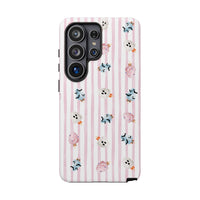 A protective phone case with a light pink and white vertical stripe pattern, decorated with small Halloween-themed cotton candy in pink, blue, and white, shown on a plain white background. sparkle paperie house