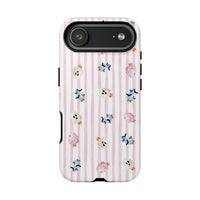 A protective phone case with a light pink and white vertical stripe pattern, decorated with small Halloween-themed cotton candy in pink, blue, and white, shown on a plain white background. sparkle paperie house