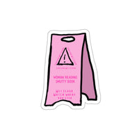 caution wet floor woman reading smutty book sticker, sparkle paperie house romance sticker