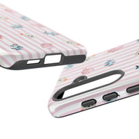 A protective phone case with a light pink and white vertical stripe pattern, decorated with small Halloween-themed cotton candy in pink, blue, and white, shown on a plain white background. sparkle paperie house