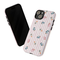 A protective phone case with a light pink and white vertical stripe pattern, decorated with small Halloween-themed cotton candy in pink, blue, and white, shown on a plain white background. sparkle paperie house
